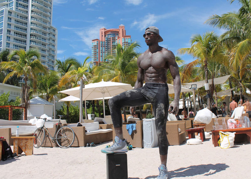 Shirtless Tony Thomas with XP106 at Beach Resort